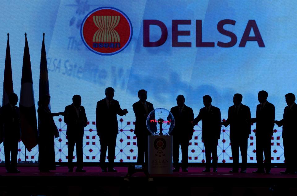 Leaders of the Association of Southeast Asian Nations (ASEAN) from left, Malaysian Prime Minister Mahathir Mohamad, Myanmar leader Aung San Suu Kyi, Philippines President Rodrigo Duterte, Singaporean Prime Minister Lee Hsien Loong, Thailand Prime Minister Prayuth Chan-ocha, Vietnamese Prime Minister Nguyen Xuan Phuc, Brunei Sultan Hassanal Bolkiah, Cambodian Prime Minister Hun Sen, Indonesian President Joko Widodo and Laos Prime Minister Thongloun Sisoulith jointly inaugurate Establishment of a Disaster Emergency Logistic System for ASEAN, (DELSA) during the opening ceremony of the ASEAN leaders summit in Bangkok, Thailand, Sunday, June 23, 2019. (AP Photo/Gemunu Amarasinghe)