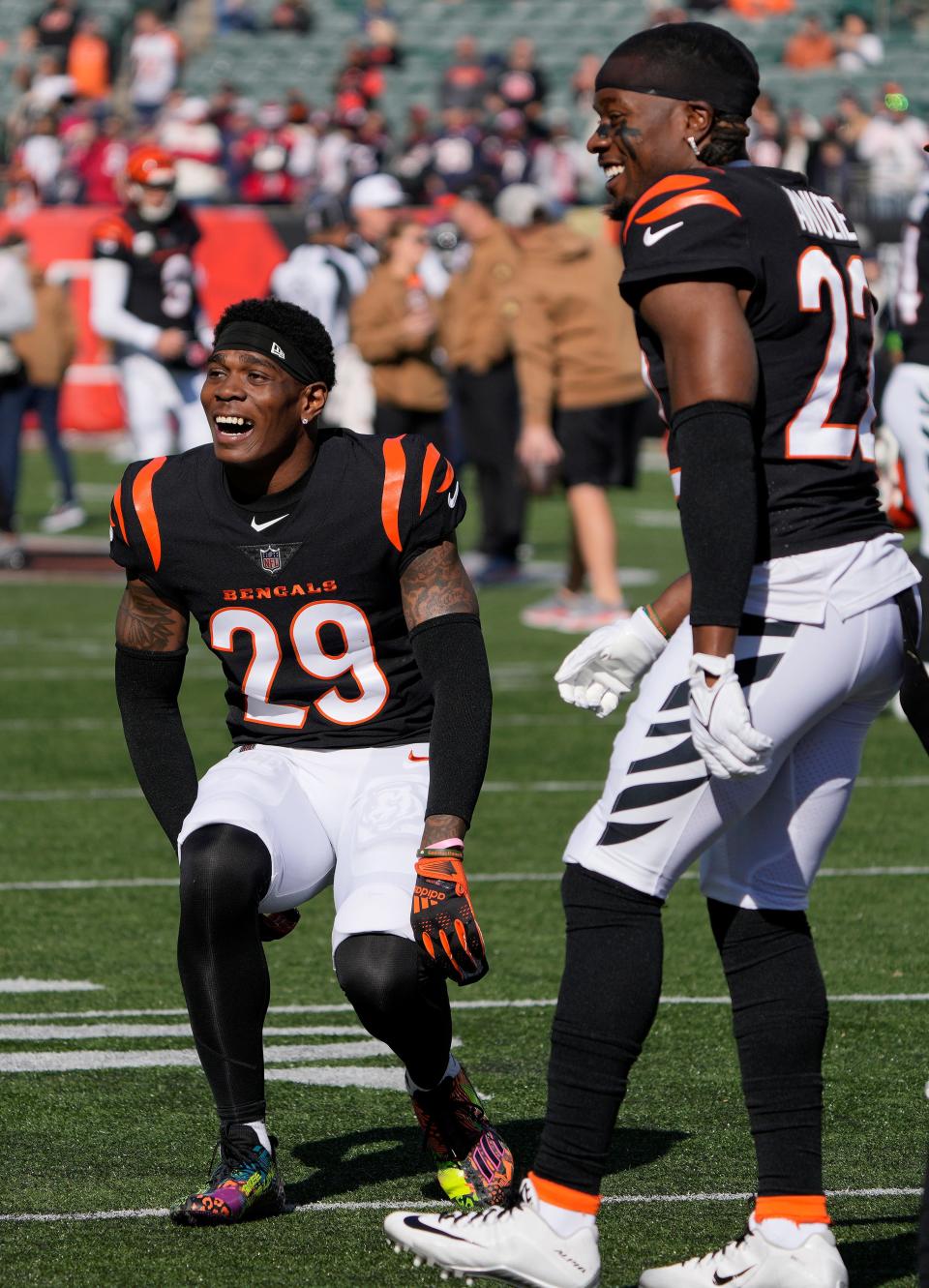 Cincinnati Bengals cornerback Cam Taylor-Britt (29) and Cincinnati Bengals cornerback Chidobe Awuzie (22) dance during warm ups before facing the Texans at Paycor Stadium Sunday, November 12, 2023.