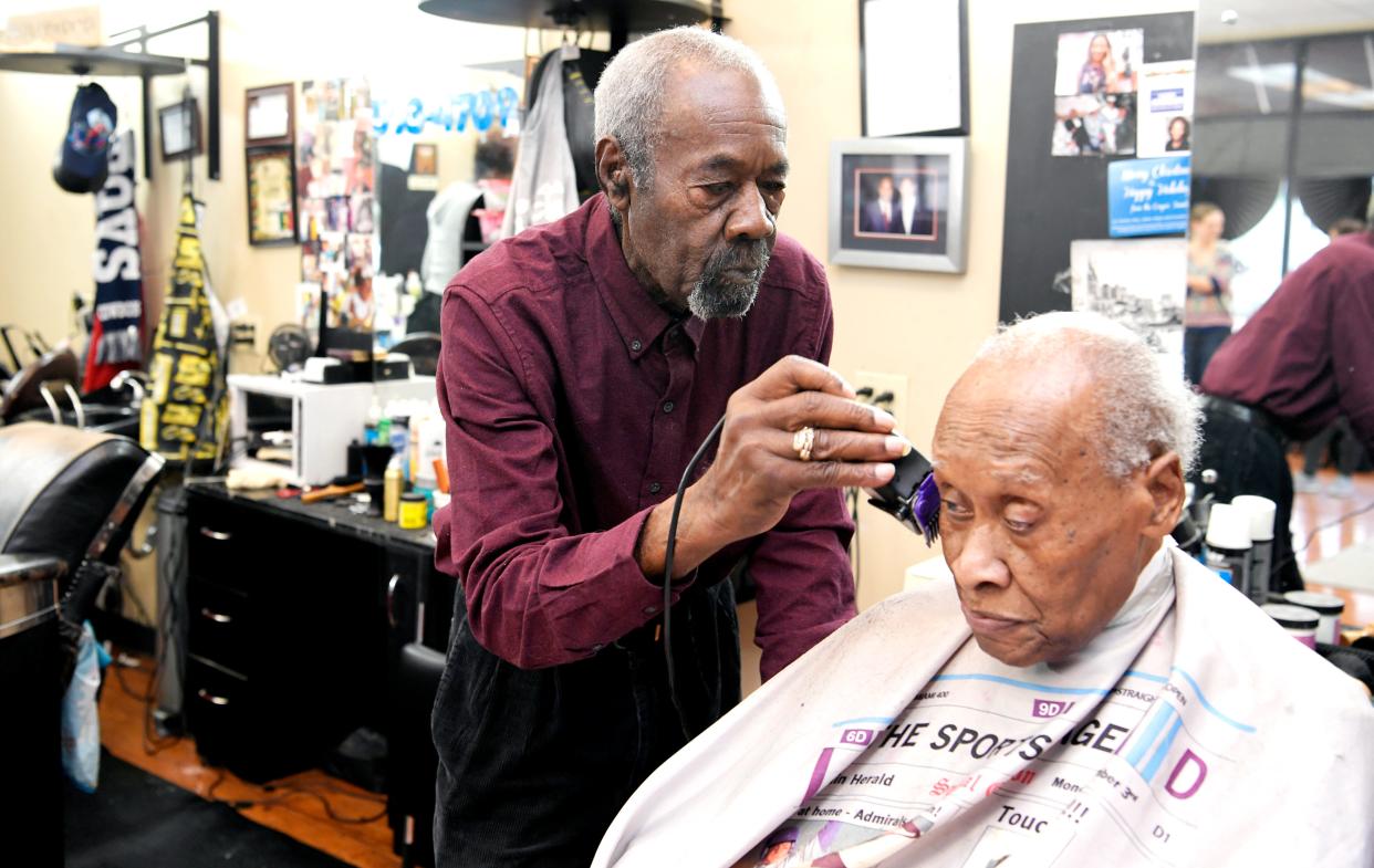 Vernon Winfrey cuts Leroy McMurray's hair at Winfrey’s barbershop in east Nashville on Jan. 11, 2018. Vernon Winfrey has owned Winfrey’s Barbershop since 1965.