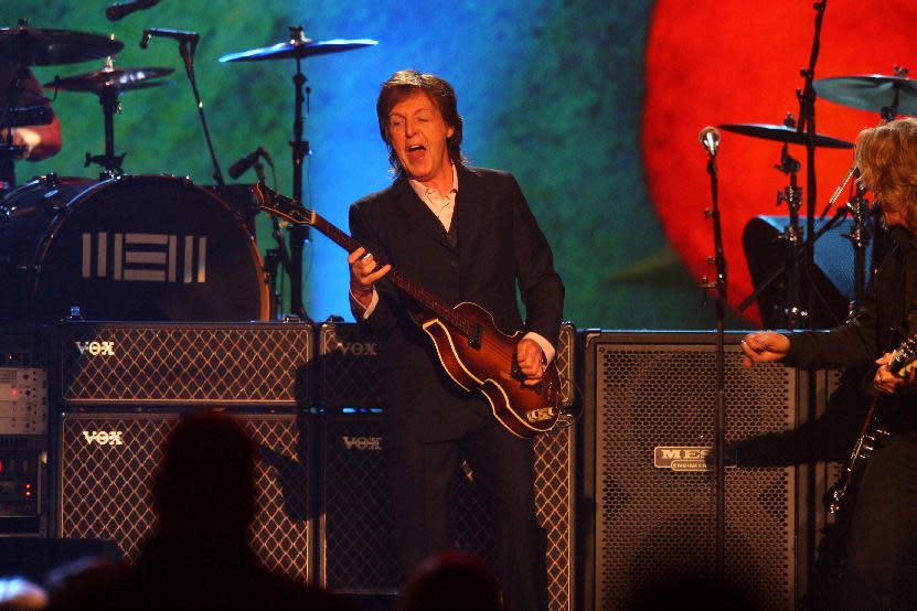 Paul McCartney performs at The Night that Changed America: A Grammy Salute to the Beatles, on Monday, Jan. 27, 2014, in Los Angeles. (Photo by Zach Cordner/Invision/AP)