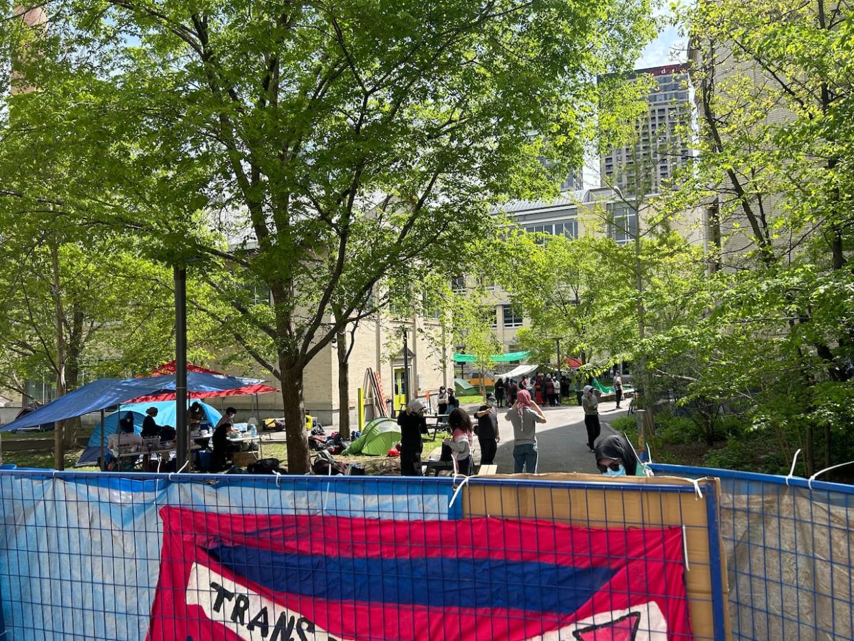 A pro-Palestinian encampment was set up at the Université du Québec à Montréal (UQAM) campus on Sunday.  (Kwabena Oduro/CBC - image credit)