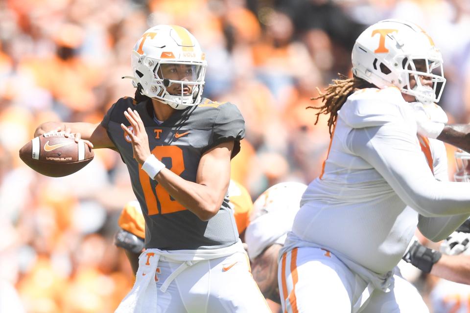 Tennessee quarterback Nico Iamaleava (12) looks to pass the ball during Tennessee football’s Orange & White spring game.