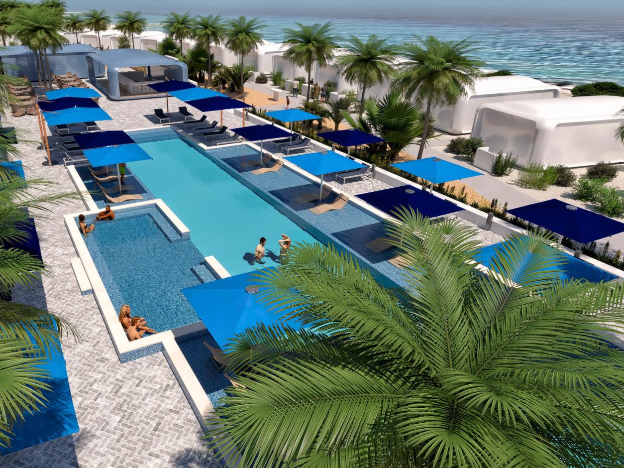 rendering of people in a pool behind modular hotel rooms