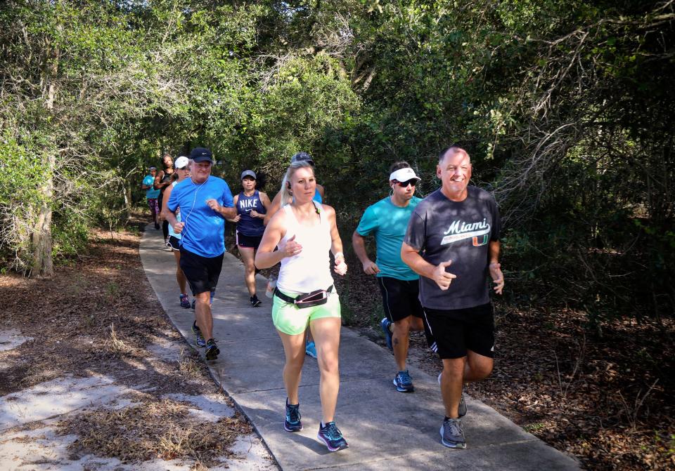 Runners participate in a free guided trail run through the scenic Yamato Scrub Natural Area in Boca Raton in 2018.