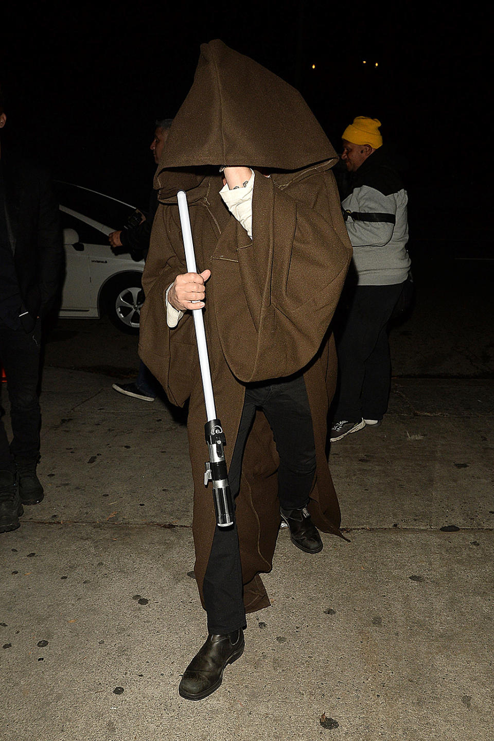 <p>The <i>Star Wars</i> fan kept a seriously low profile at a Halloween party in Hollywood. Look at that light saber! (Photo: AKM-GSI) </p>