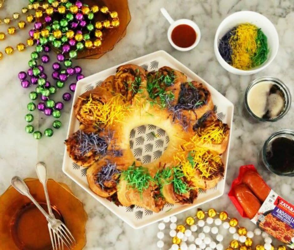 <p>Joy the Baker</p><p>Who says only the sweet version of this traditional Mardi Gras cake can have all the fun? Put a tasty twist on it this year with savory flavors like smoked sausage.</p><p><strong>Get the recipe: <a href="https://parade.com/994895/kelli-acciardo/savory-king-cake-with-smoked-sausage-recipe/" rel="nofollow noopener" target="_blank" data-ylk="slk:Savory King Cake;elm:context_link;itc:0;sec:content-canvas" class="link rapid-noclick-resp">Savory King Cake</a></strong></p>