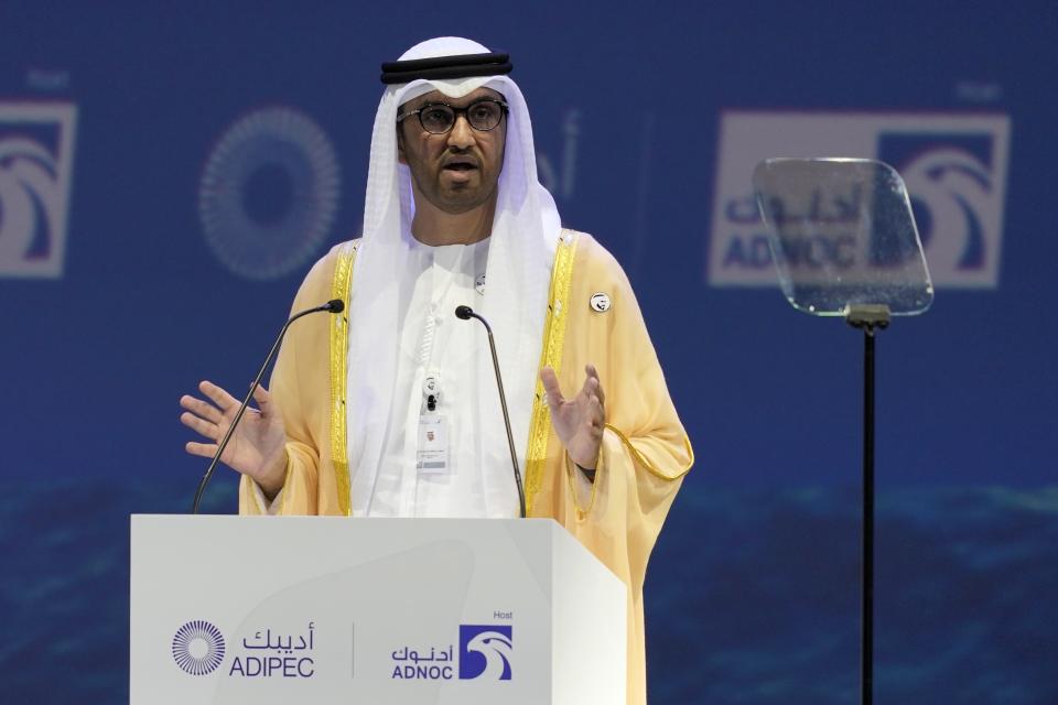 FILE - The Emirati Minister of State and the CEO of Abu Dhabi's state-run Abu Dhabi National Oil Co. Sultan Ahmed al-Jaber talks at the Abu Dhabi International Petroleum Exhibition & Conference in Abu Dhabi, United Arab Emirates, Oct. 31, 2022. Climate activists in Africa have expressed anger toward the United Nations climate agency, accusing it of allowing corporations and individuals with “dubious” climate credentials to “greenwash” their polluting activities by participating in its annual climate conference. The criticism follows Thursday’s announcement that oil executive Sultan al-Jaber will lead the next round of U.N. climate talks, which will be held in the United Arab Emirates in late November. (AP Photo/Kamran Jebreili, File)