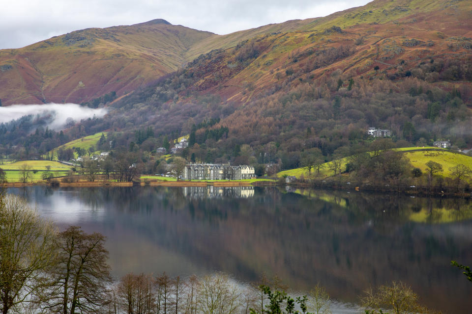 Early morning mist over Lake Grasmere in the Lake District National Park. (Photo by: Martin Berry/Loop Images/Universal Images Group via Getty Images)