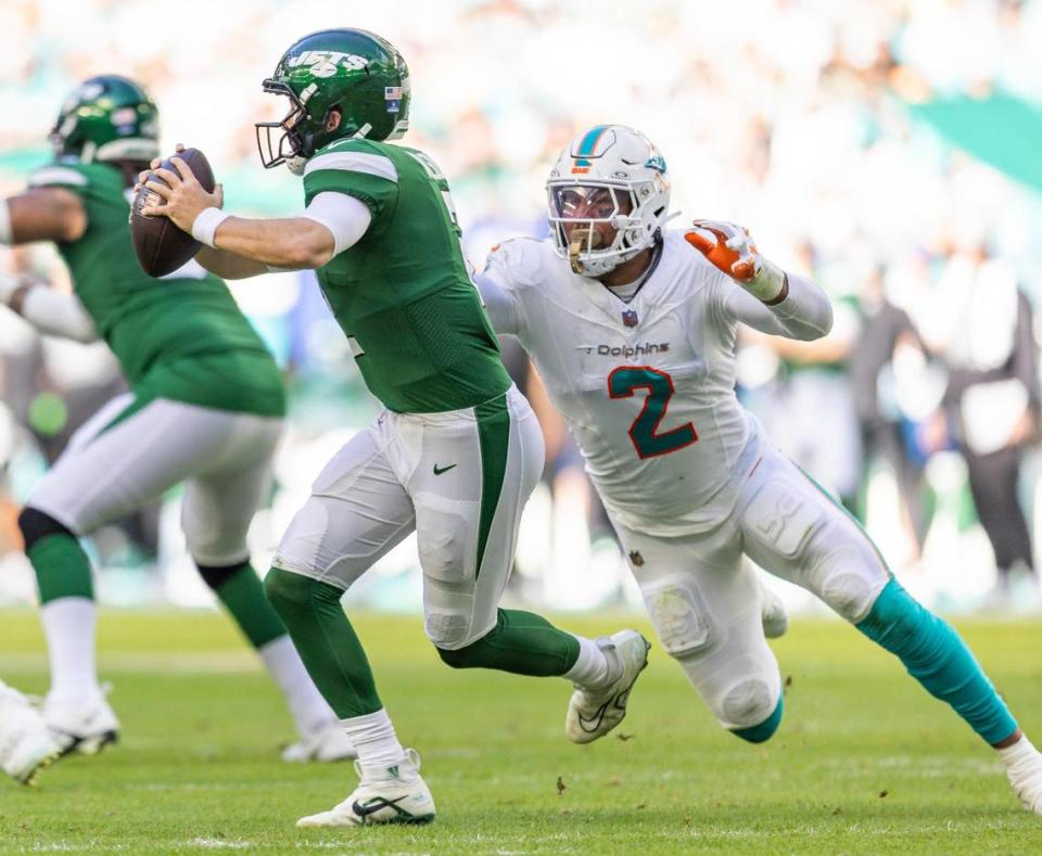 Miami Dolphins linebacker Bradley Chubb (2) sacks New York Jets quarterback Zach Wilson (2) in the second quarter of an NFL game at Hard Rock Stadium on Sunday, Dec. 17, 2023, in Miami Gardens, Fla.