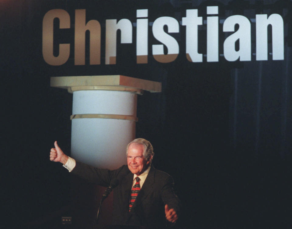 FILE - Rev. Pat Robertson addresses the Christian Coalition "Road to Victory '98" conference in Washington on Sept. 18, 1998. Robertson died Thursday, June 8, 2023. (AP Photo/Roberto Borea, File)