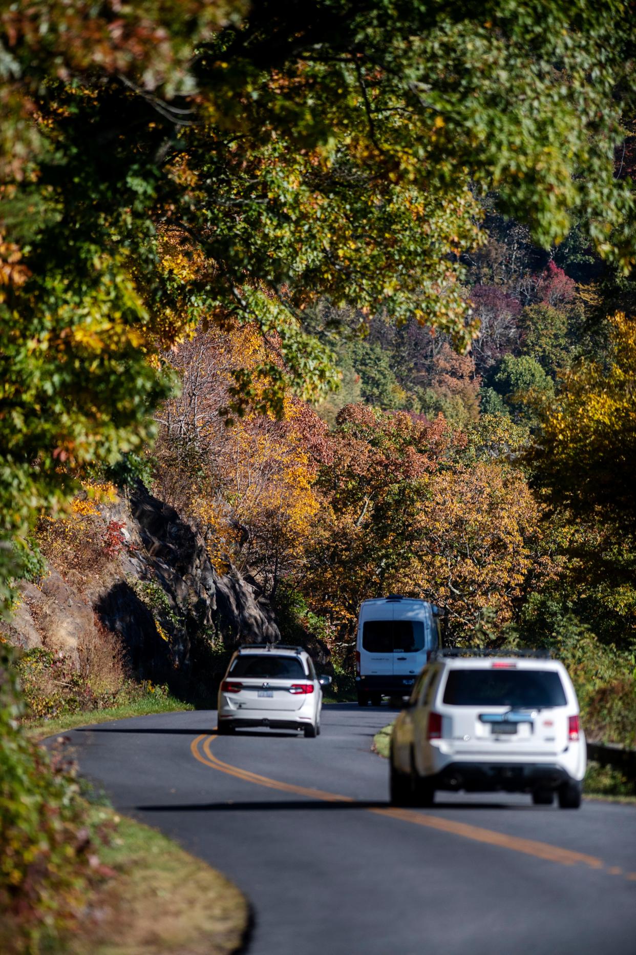 Motorists travel on the Blue Ridge Parkway near Asheville, October 19, 2023.