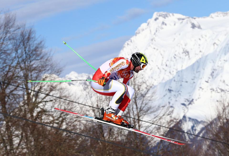 Canada's Manuel Osborne-Paradis makes a jump during a men's downhill training run for the Sochi 2014 Winter Olympics, Saturday, Feb. 8, 2014, in Krasnaya Polyana, Russia.(AP Photo/Alessandro Trovati)
