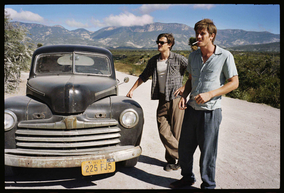 This undated publicity film image released by IFC Films/Sundance Selects shows Sam Riley, left, as Sal Paradise/Jack Kerouac and Garrett Hedlund, right, as Dean Moriarity/Neal Cassady in a scene from the film, "On the Road," directed by Walter Salles. (AP Photo/IFC Films/Sundance Selects, Gregory Smith)