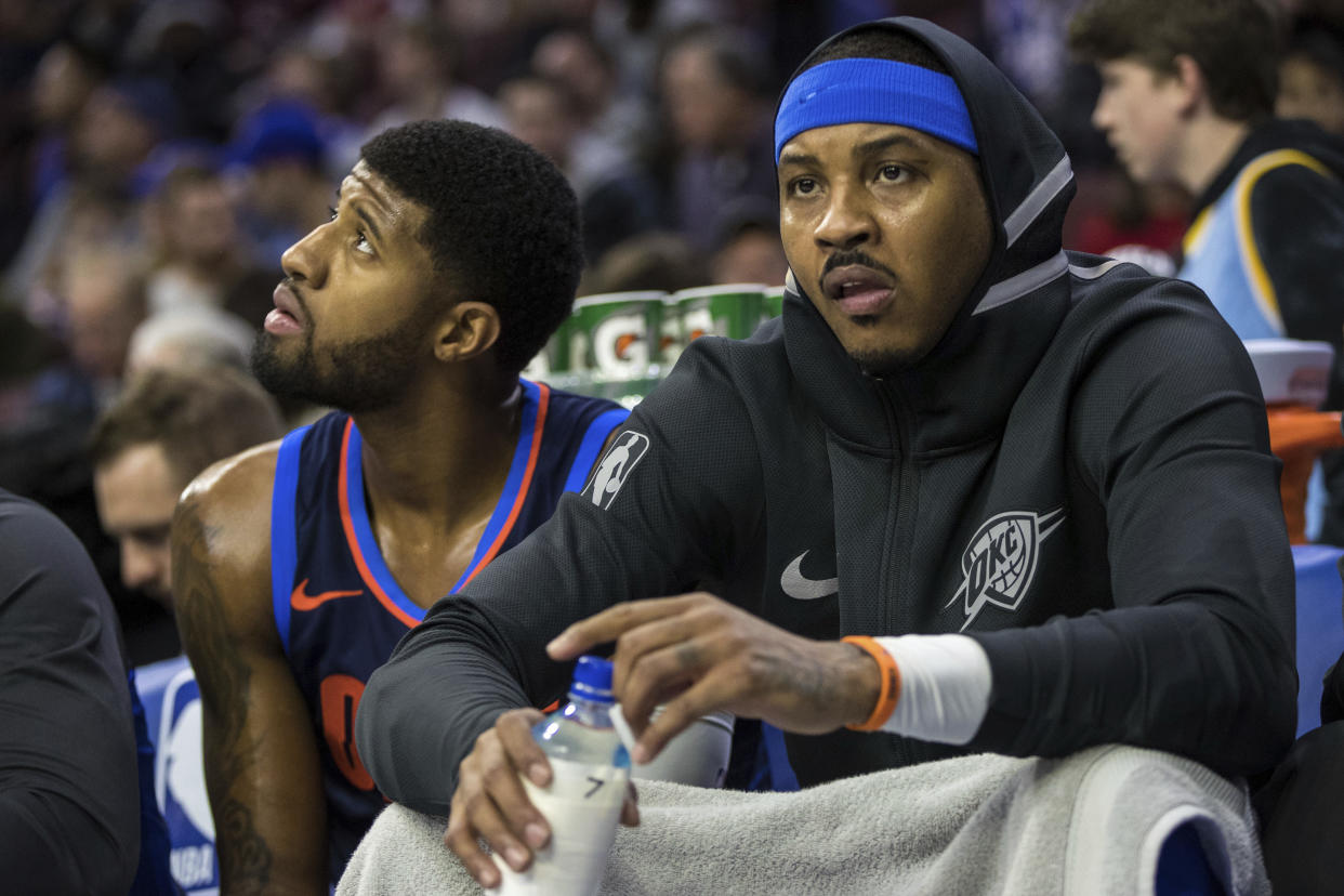 In different ways, the Thunder are hoping Paul George and Carmelo Anthony buy in this summer. (AP)