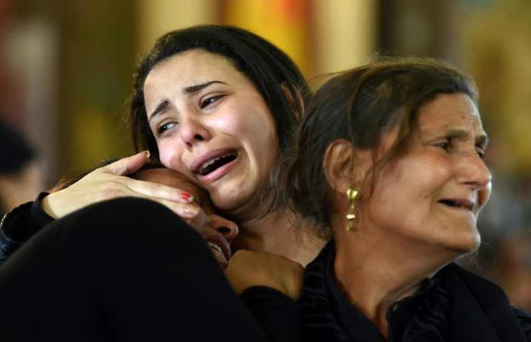 Women mourn for the victims of the blast at the Coptic Christian Saint Mark's church in Alexandria during a funeral procession at the Monastery of Marmina in nearby Borg El-Arab on April 10, 2017