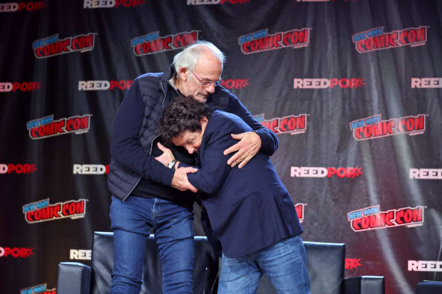 NEW YORK, NEW YORK - OCTOBER 08: Actors Christopher Lloyd (L) and Michael J. Fox attend a "Back To The Future Reunion" at New York Comic Con on <a href="https://parade.com/living/october-holidays-observances/" rel="nofollow noopener" target="_blank" data-ylk="slk:October;elm:context_link;itc:0;sec:content-canvas" class="link ">October</a> 08, 2022 in New York City. (Photo by Mike Coppola/Getty Images)<p><a href="https://www.gettyimages.com/detail/1431845439" rel="nofollow noopener" target="_blank" data-ylk="slk:Mike Coppola/Getty Images;elm:context_link;itc:0;sec:content-canvas" class="link ">Mike Coppola/Getty Images</a></p>