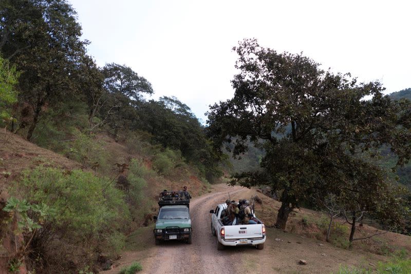 The Wider Image: "Under siege": Inside Mexican village where children are armed