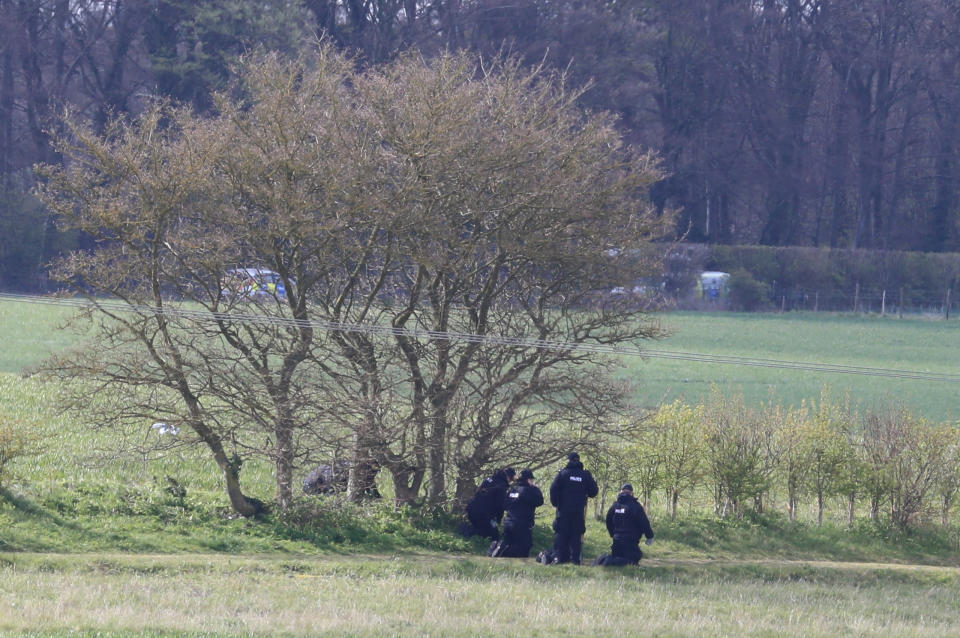 Police officers conduct a fingertip search near to the scene in Snowdown, Kent, where the body of PCSO Julia James was found. Kent Police have launched a murder enquiry following the discovery of the 53-year-old community support officer on Tuesday. Picture date: Thursday April 29, 2021.