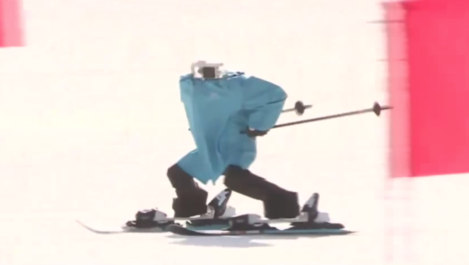 A skiing robot heads down a ski slope. (Screenshot: YouTube)