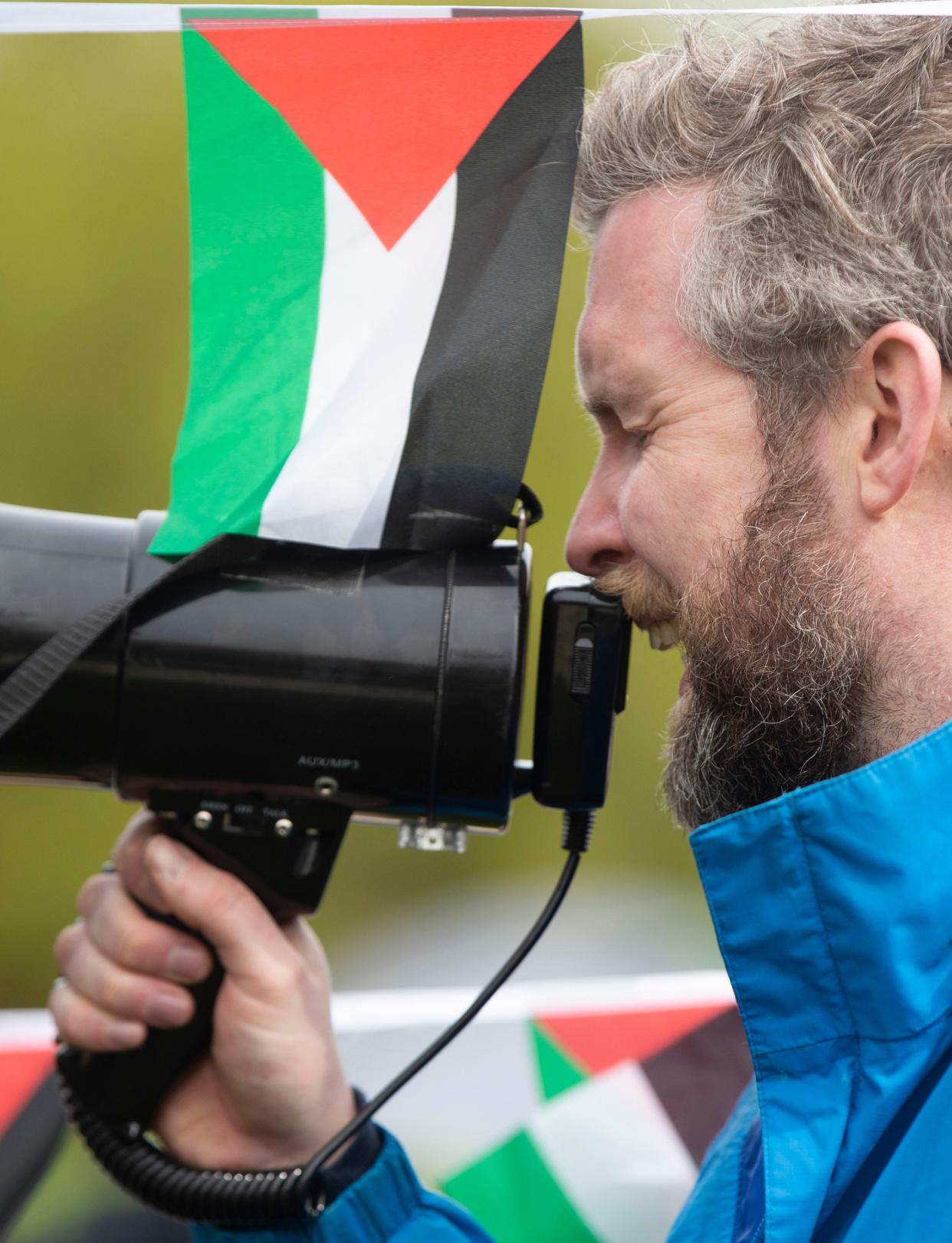 Purdue University Clinical Assistant Professor Muiris MacGiollabhuí speaks during the encampment protest, Friday, April 26, 2024, at Purdue University Memorial Mall in West Lafayette, Ind.