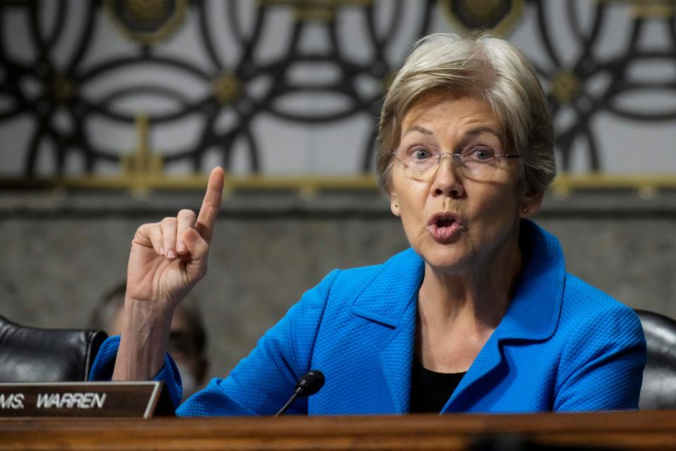 Sen. Elizabeth Warren, D-Mass., questions former executives of failed banks during a Senate Banking Committee hearing on Capitol Hill on Tuesday in Washington. The hearing was held to examine the recent failures of Silicon Valley Bank and Signature Bank.