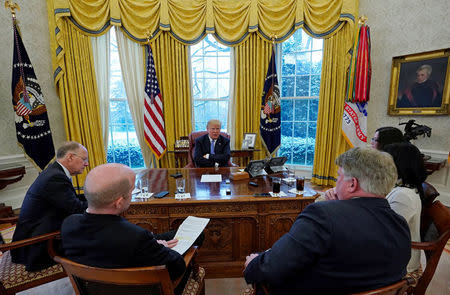 U.S. President Donald Trump speaks during an interview with Reuters at the White House in Washington, U.S., January 17, 2018. REUTERS/Kevin Lamarque