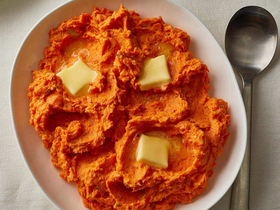 Mashed Sweet Potatoes With Roasted Garlic. / Credit: Bryan Gardner for The New York Times. Food Stylist: Barrett Washburne. Prop Stylist: Paige Hicks.