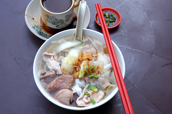 Start the day with a bowl of noodles filled to the brim with sliced pork, minced pork patty, various innards and coagulated blood cubes. – Pictures by Lee Khang Yi