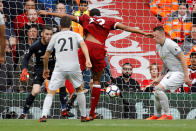 <p>Liverpool’s Joel Matip shoots at goal</p>