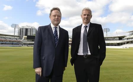 File photo of England's Peter Moores (R) posing for a photograph with then Managing Director of England cricket Paul Downton after a news conference at Lord's cricket ground in London April 19, 2014. REUTERS/Philip Brown