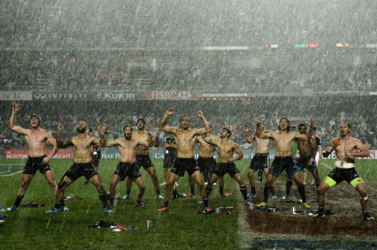 New Zealand's players perform the Haka after their victory over England in the final of Hong Kong rugby Sevens tournament, on March 30, 2014