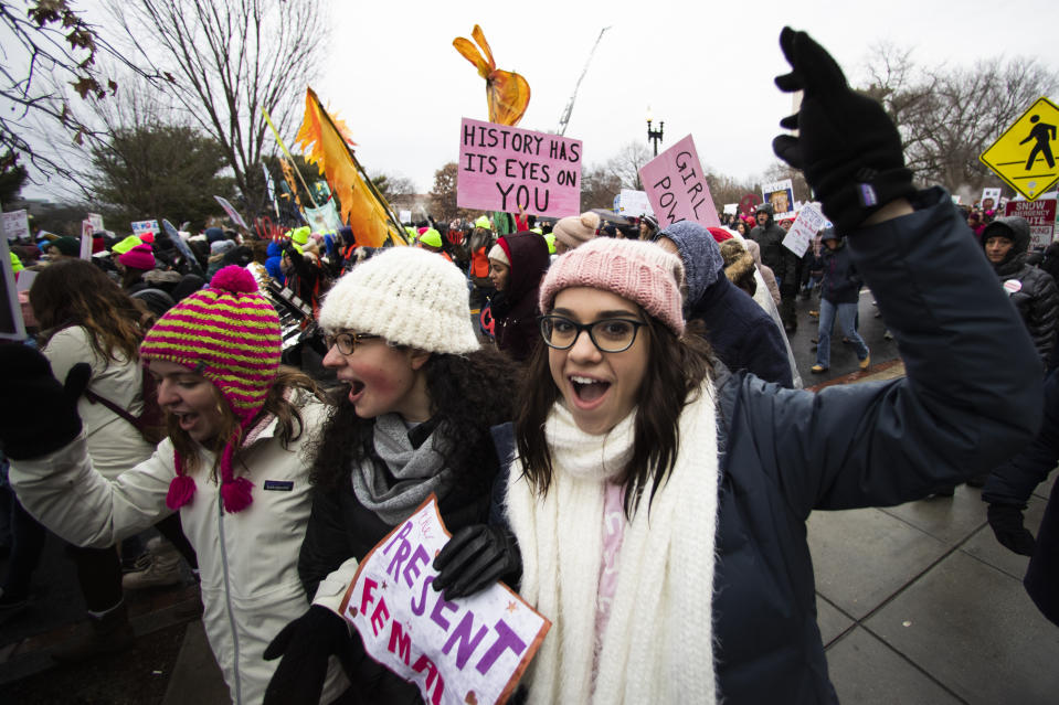 Georgetown students, from left, Emma Garman, Annmarie Rotatori and Claire Tebbutt, join the Women's March near the White House, Saturday, Jan. 18, 2020, in Washington. (AP Photo/Manuel Balce Ceneta)