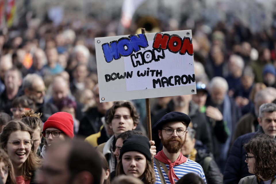 Protesters march during a demonstration in Nantes, western France, Wednesday, March 15, 2023. Opponents of French President Emmanuel Macron's pension plan are staging a new round of strikes and protests as a joint committee of senators and lower-house lawmakers examines the contested bill. (AP Photo/Jeremias Gonzalez)