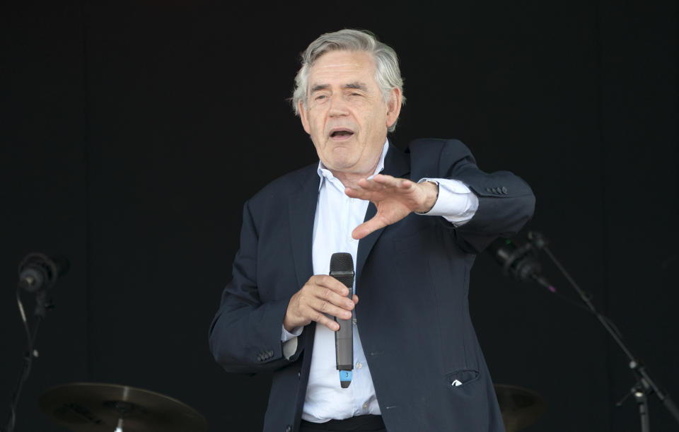 Former Prime Minister Gordon Brown speaks to the crowds and competitors at the Scottish Coal Carrying Championships in Kelty in Fife. Picture date: Saturday August 28, 2021. (Photo by Jane Barlow/PA Images via Getty Images)