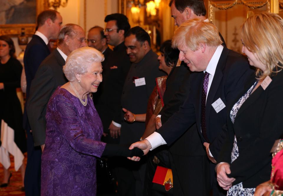 Queen Elizabeth II greets Foreign Secretary Boris Johnson at a reception to mark the launch of the UK-India Year of Culture 2017 at Buckingham Palace, London.