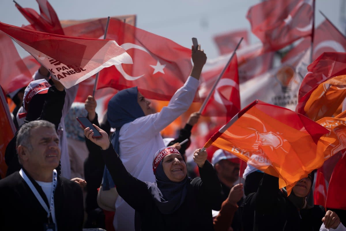 AKP supporters at Sunday’s rally in Istanbul (AP)