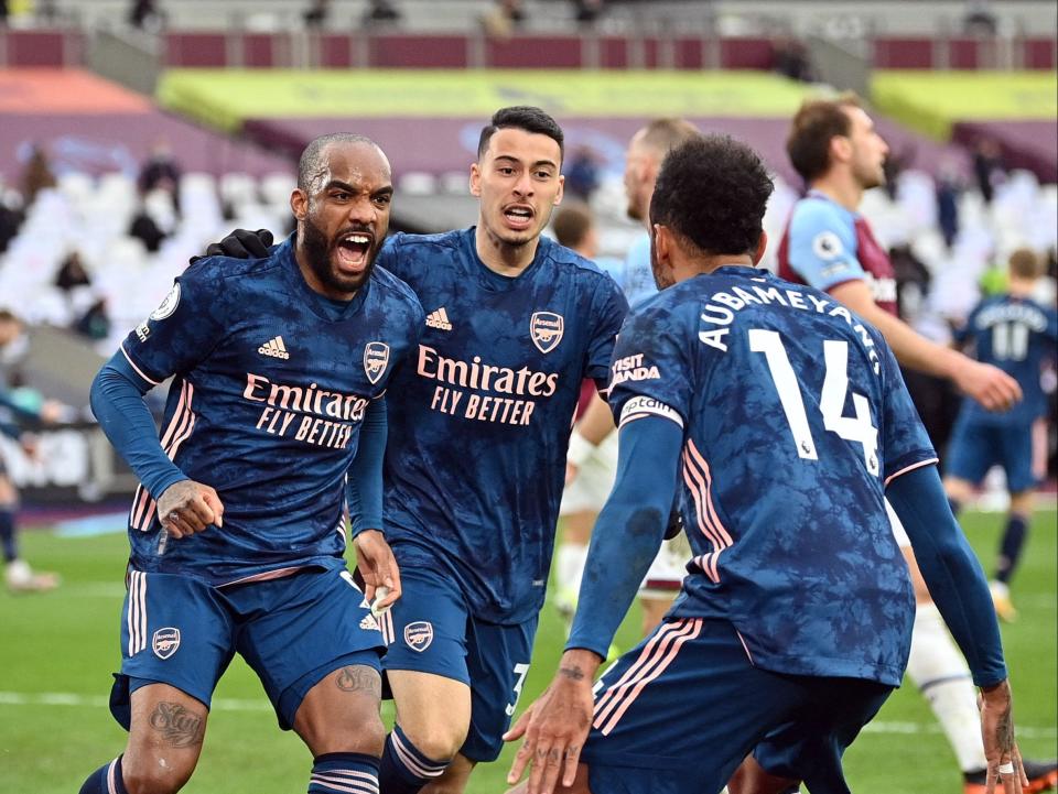 <p>Alexandre Lacazette (left) netted Arsenal’s equaliser</p> (POOL/AFP via Getty Images)