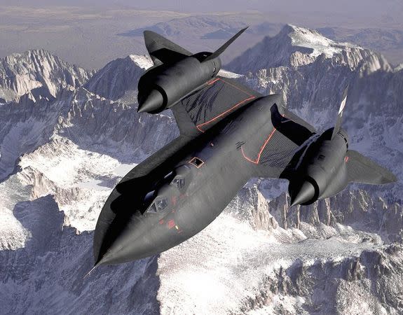 The SR-71B Blackbird, flown by the Dryden Flight Research Center as NASA 831, flies over California's southern Sierra Nevada Mountains.