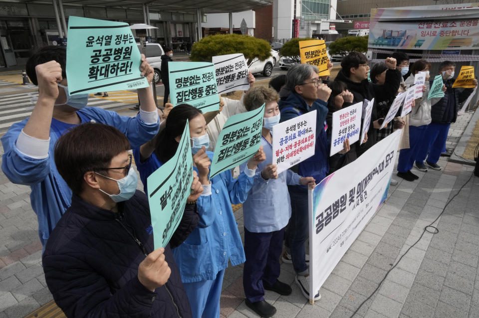 Members of The Korean Public Service and Transport Workers' Union stage a rally to demand expansion of public hospitals and medical students at the Seoul National University Hospital in Seoul, South Korea, Tuesday, Feb. 27, 2024. (AP Photo/Ahn Young-joon)