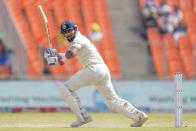 India's Virat Kohli plays a shot during the fourth day of the fourth cricket test match between India and Australia in Ahmedabad, India, Sunday, March 12, 2023. (AP Photo/Ajit Solanki)