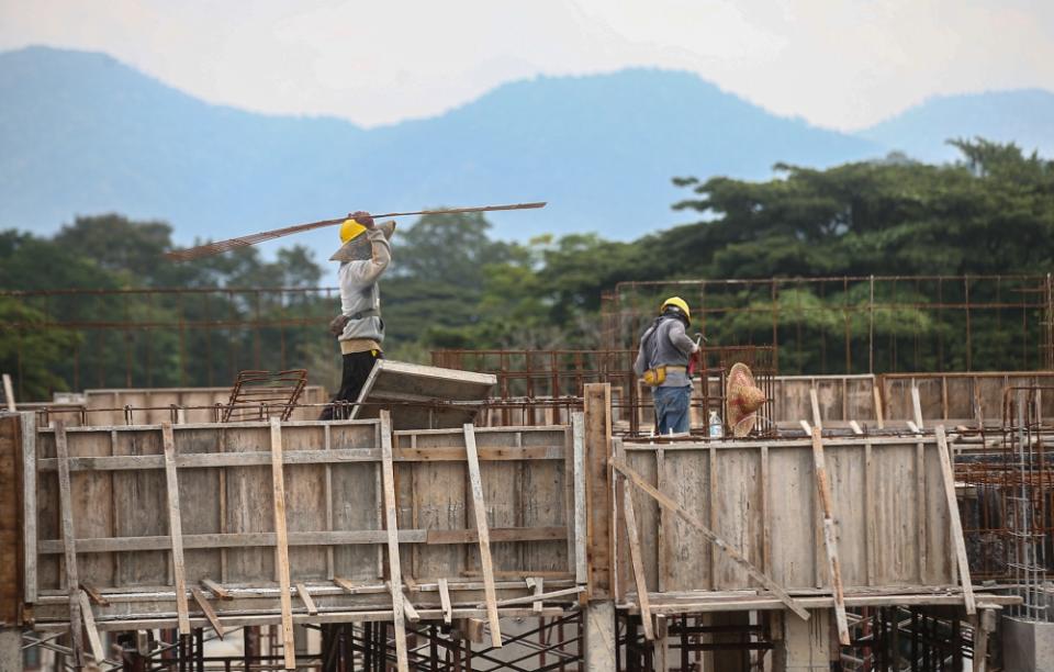 The Anwar administration has vowed to tighten regulation around migrant worker recruitment as part of a broader governance reform, but has so far remained silent about regulating recruitment levy and fees, which can go up to RM25,000 per person. — Picture by Farhan Najib