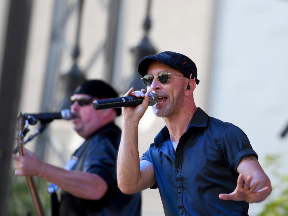 New Wave Nation lead vocalist Jay Secrest performs at the Massillon Independence Day Celebration on Duncan Plaza in July.