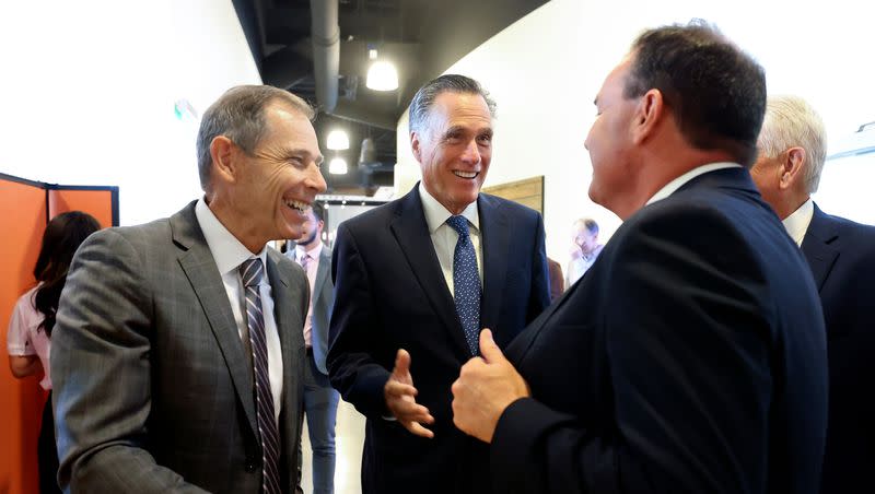 Rep. John Curtis, R-Utah, Sen. Mitt Romney, R-Utah, and Sen. Mike Lee, R-Utah, meet during a South Valley Chamber of Commerce meeting at Salt Mine Productive in Sandy on Thursday, Aug. 18, 2022. Romney announced on Wednesday, Sept. 13, 2023, that he will not run for a second term in the senate.