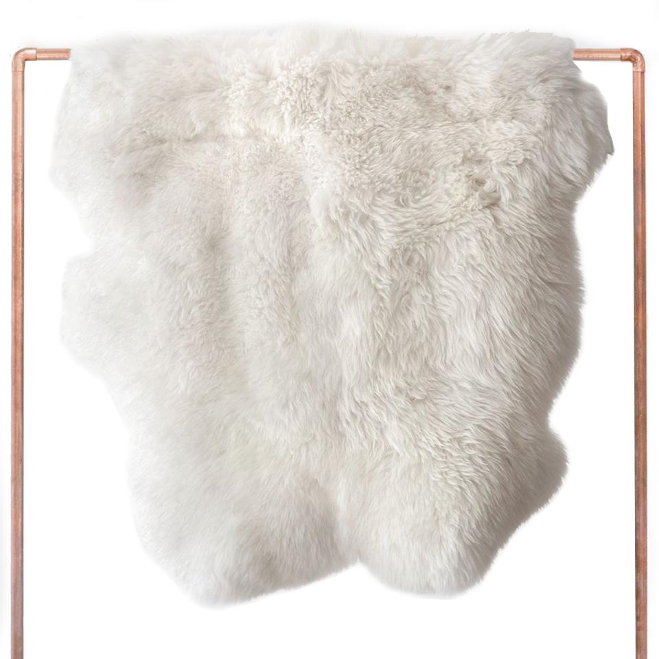 <p><a href="https://go.redirectingat.com?id=74968X1596630&url=https%3A%2F%2Fwww.the-citizenry.com%2Fproducts%2Fsheepskin-accent-rug-white%3Fv%3D19804857335881&sref=https%3A%2F%2Fwww.esquire.com%2Flifestyle%2Fa60222967%2Fhome-awards-2024%2F" rel="nofollow noopener" target="_blank" data-ylk="slk:Shop Now;elm:context_link;itc:0;sec:content-canvas" class="link ">Shop Now</a></p><p>Sheepskin Rug</p><p>the-citizenry.com</p><p>$899.00</p>