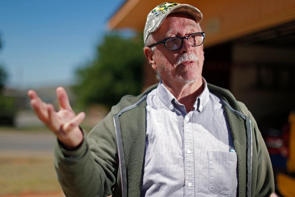 Robert Koon, shown talking outside his Del City home, is against a proposed new county jail location that is close to his Del City home.