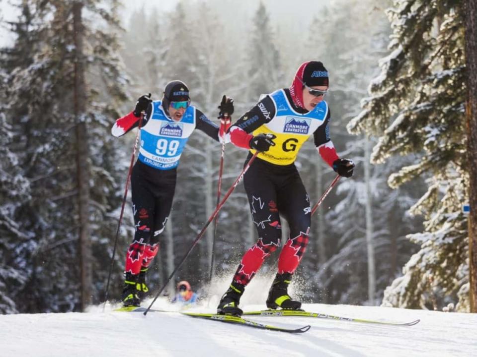 Brian McKeever, left, captured gold medals in the men's visually impaired middle-distance skate-ski race on Saturday and Sunday at the Para Nordic Skiing World Cup in Canmore, Alta. (Nordiq Canada - image credit)