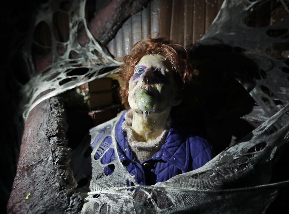 In this Wednesday, Sept. 12, 2018 photo, the character Barb appears in grand, gory style in the Stranger Things haunted house during Halloween Horror nights at Universal Studios in Orlando, Fla. The “Stranger Things” house is one of 10 haunted houses built for this year’s Halloween Horror Nights running through early November. (AP Photo/John Raoux)