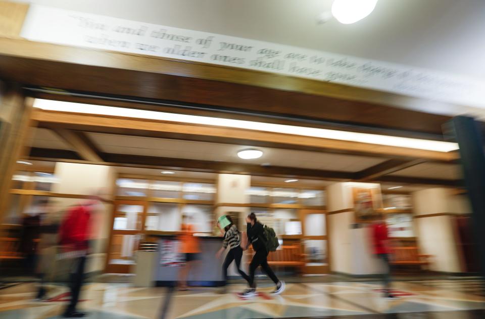FILE - Students walk to their first class on the first day of school at Lincoln High School in September 2019.