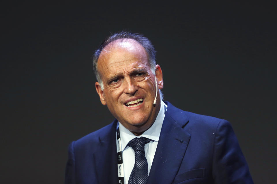 FILE - In this Monday, Sept. 24, 2018 file photo, Javier Tebas, the president of the Spanish La Liga, speaks during the World Football summit in Madrid, Spain. A Spanish court is going to decide Thursday, Nov. 14, 2019 whether the Spanish league will be allowed to play the Villarreal-Atletico Madrid game in the United States next month. The league accuses the Spanish soccer federation of unfair competition for not giving its approval for the game scheduled for Dec. 6. The dispute is the latest between league president Javier Tebas and federation president Luis Rubiales, two outspoken figures in Spanish soccer who have been at odds over a series of issues. (AP Photo/Paul White, file)