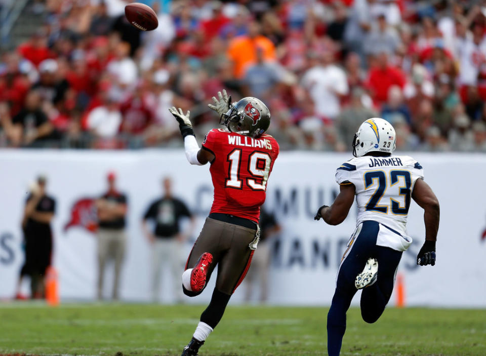 Receiver Mike Williams #19 of the Tampa Bay Buccaneers catches a pass in front of defensive back Quentin Jammer #23 of the San Diego Chargers during the game at Raymond James Stadium on November 11, 2012 in Tampa, Florida. (Photo by J. Meric/Getty Images)